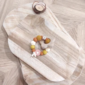 Anneau de dentition jaune moutarde fleur