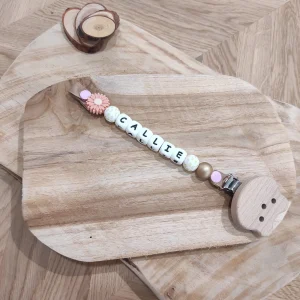 Attache tétine fantaisie fleurs printanières