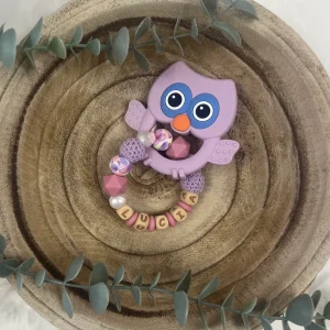 Anneau de dentition papillon lilas et rose thé