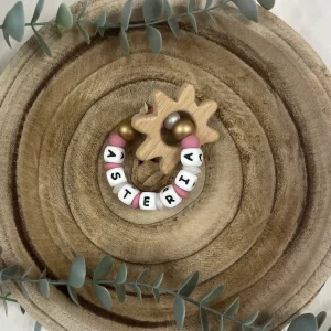 Anneau de dentition doré et rose thé