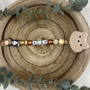 Attache tétine chien et or