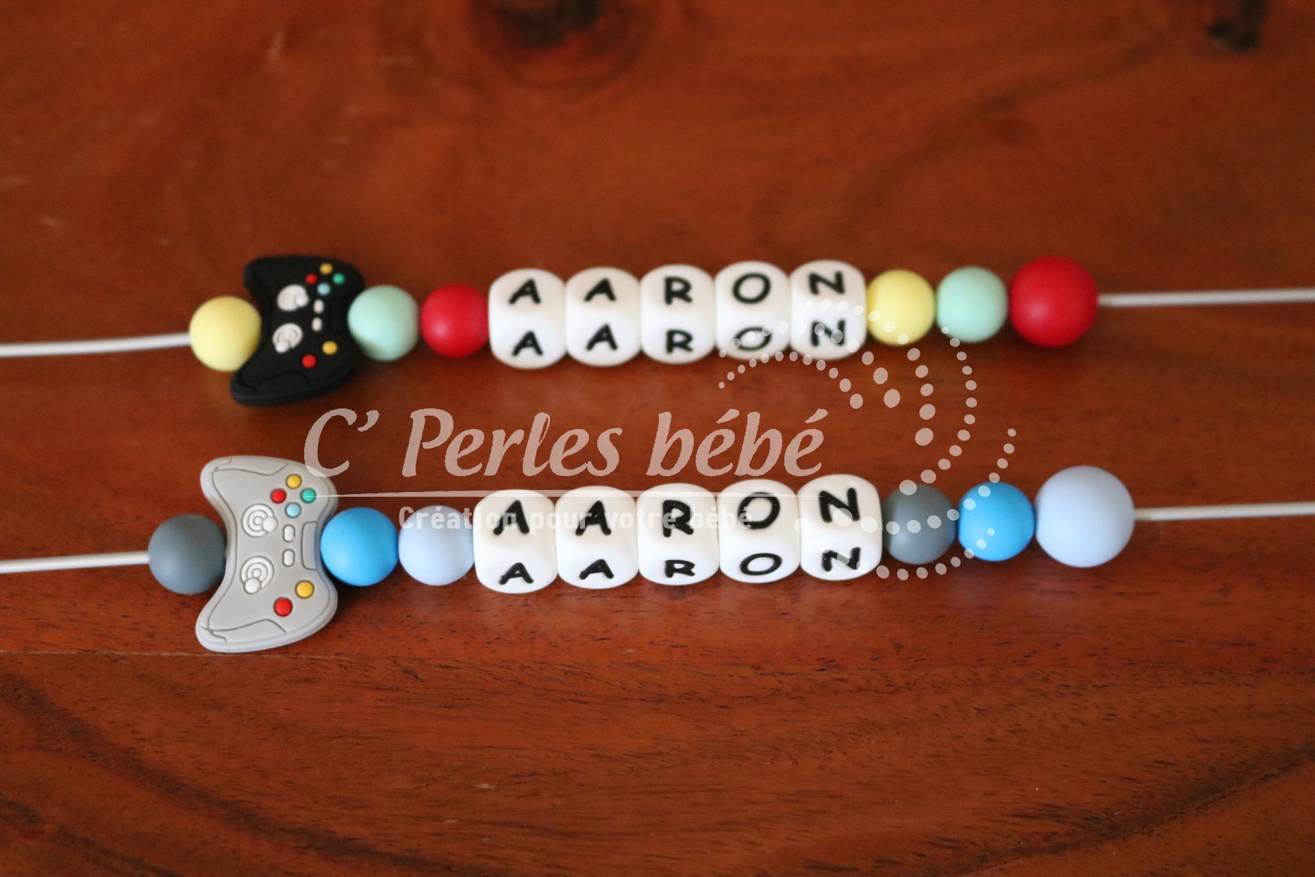 Attache tétine silicone console