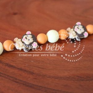 Attache tétine petit lion