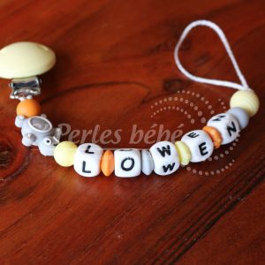 Attache tétine tortue jaune