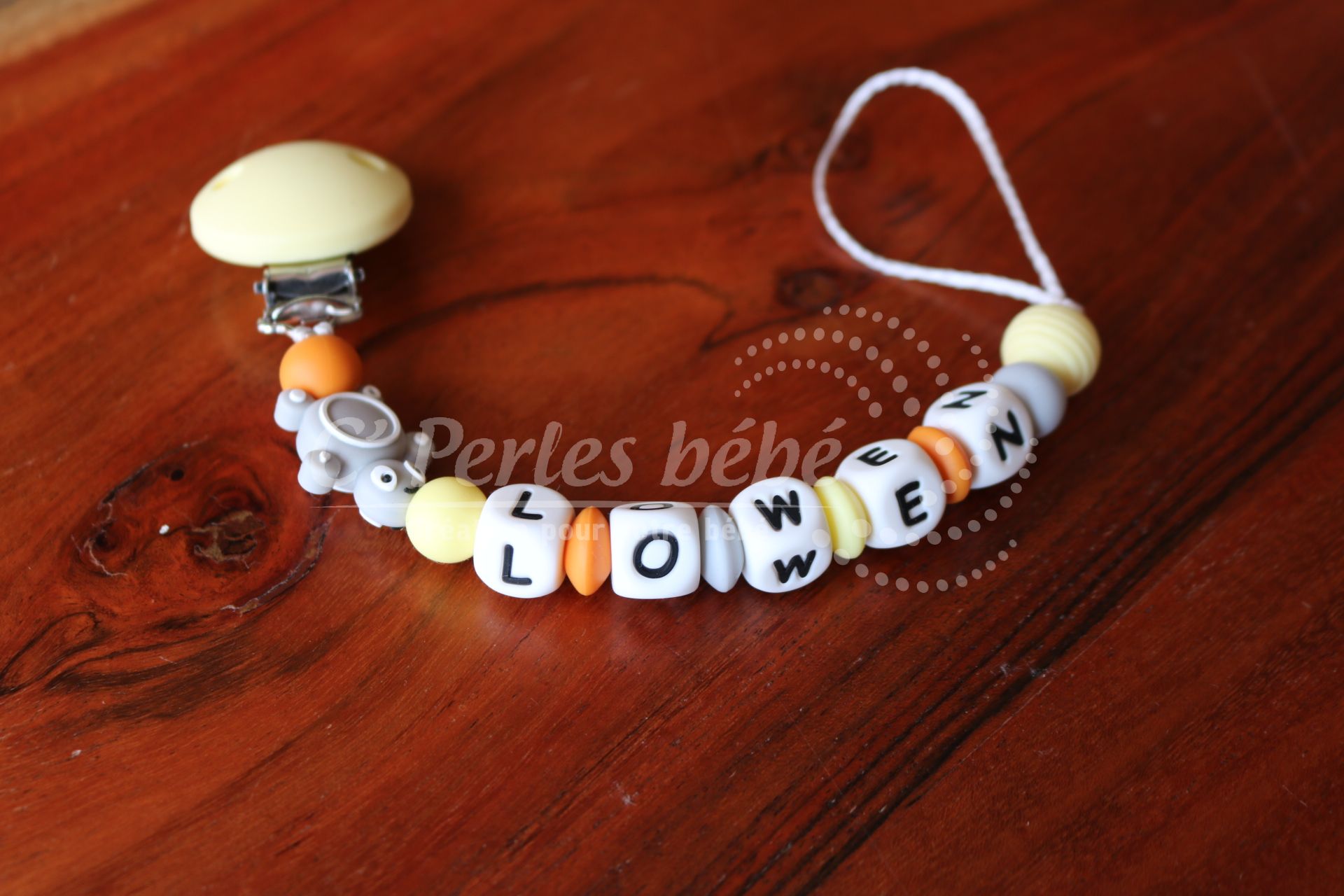 Attache tétine tortue jaune