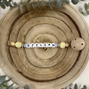 Attache tétine bleu ciel et jaune