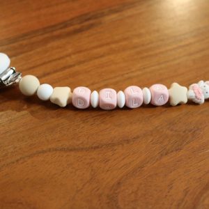 Attache tétine lapin danseur