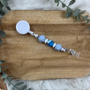 Badge bleu ciel et océan