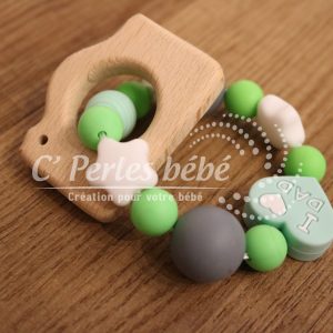 Hochet bois appareil photo