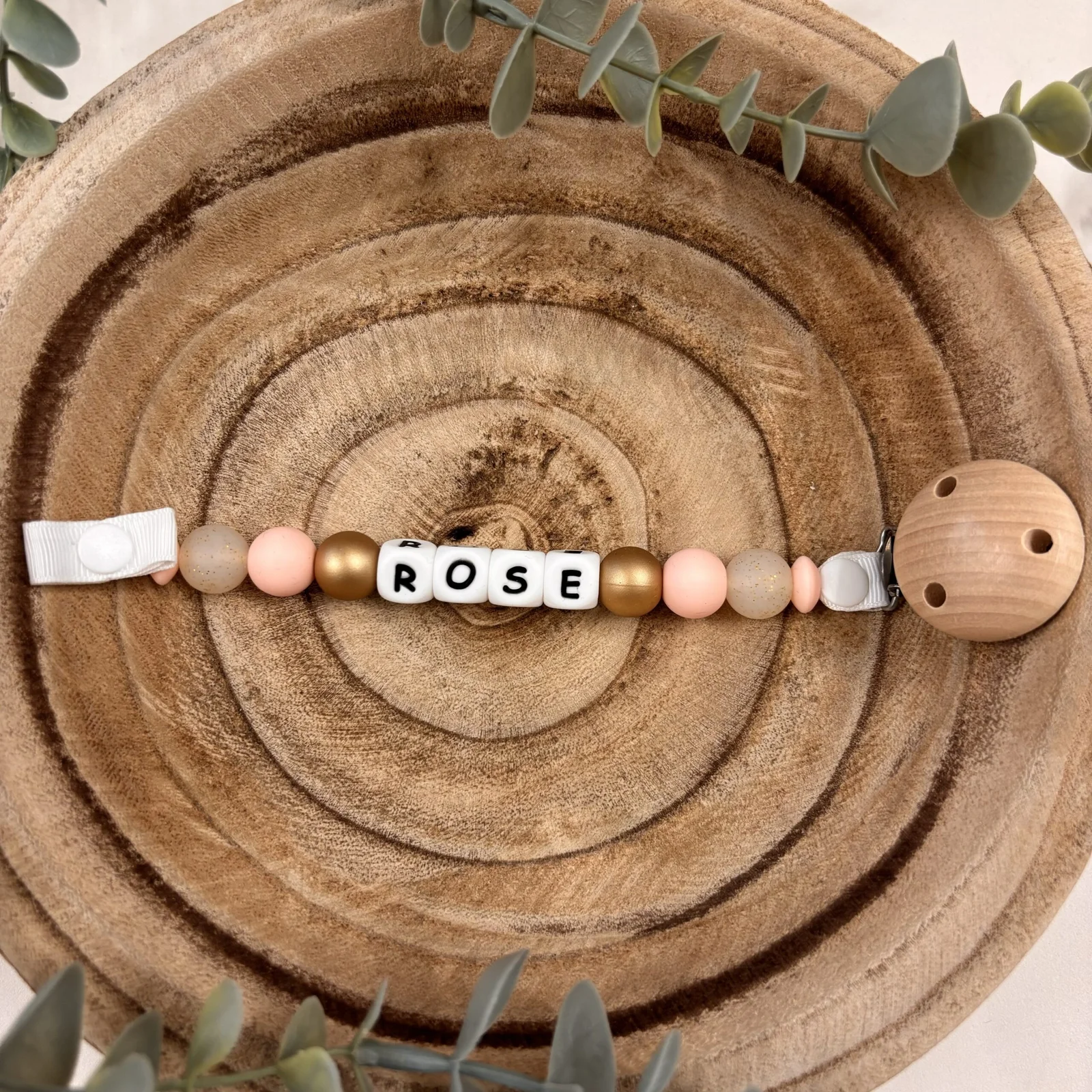 Attache tétine doré et paillettes