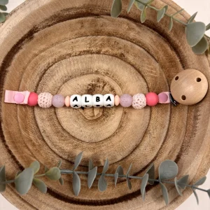 Attache tétine rose et paillettes