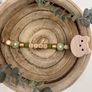 Attache tétine fantaisie marguerite vert sage