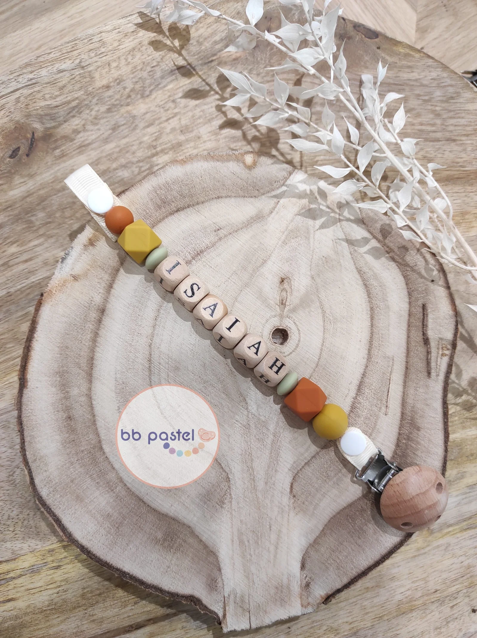 Attache tétine ocre et moutarde