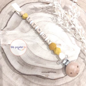 Attache tétine jaune moutarde