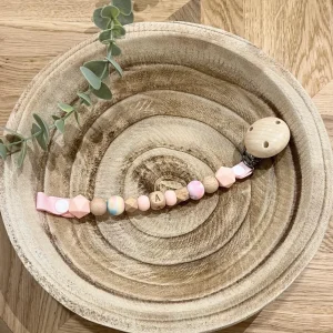 Attache tétine poudré