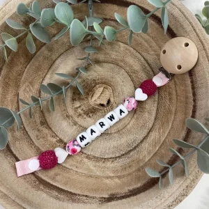 Attache tétine pivoine rose